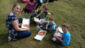 Eating pizza at the Summer Fayre